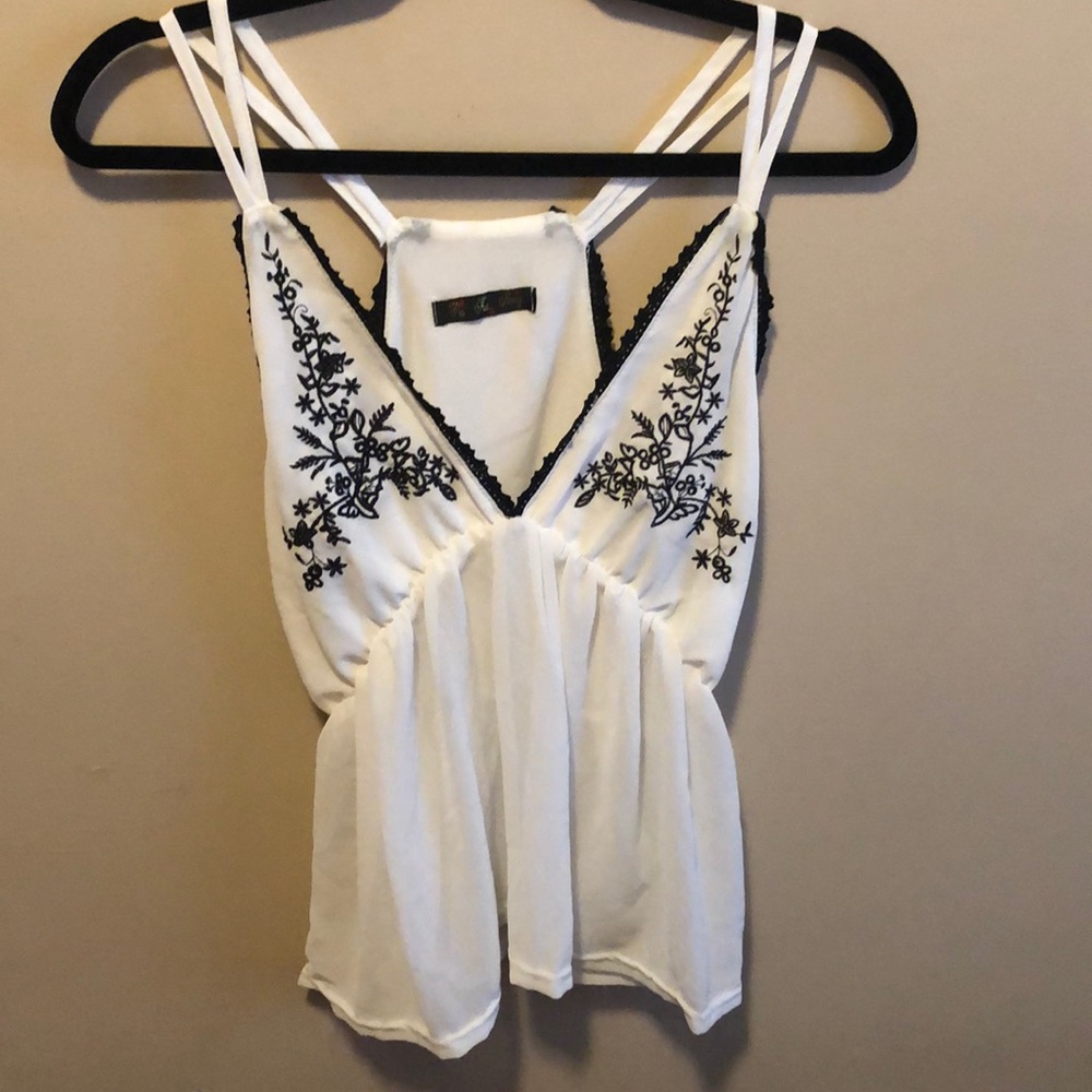 White embroidered top purchased in Thailand